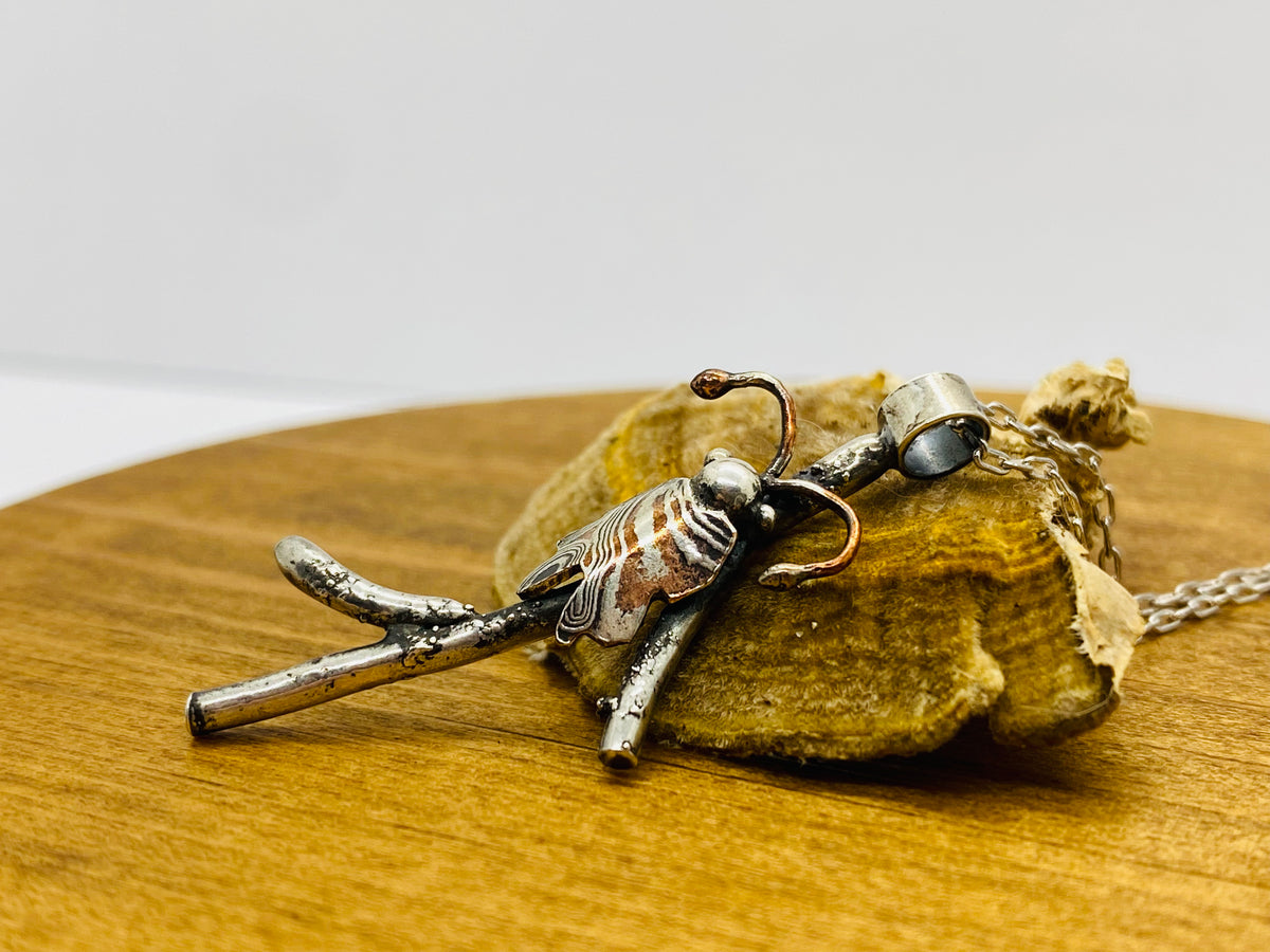 Mokume Gane beetle on twig necklace
